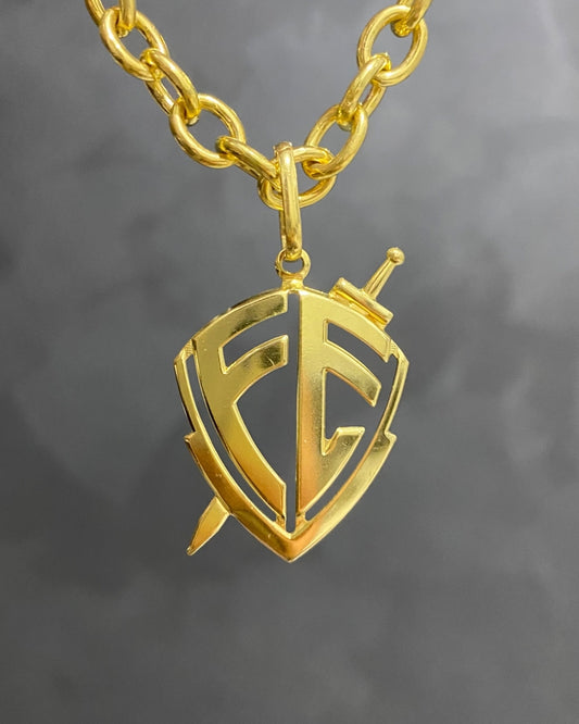PINGENTE ESCUDO DA FÉ VAZADO - 3,5x3cm